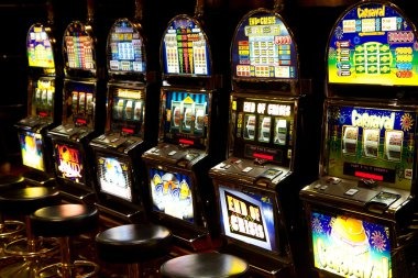Slot game mechanics and live-dealer table interface